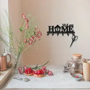 One-piece wall - mounted key holder boasting 6 hooks. Its decorative metal construction and simple, creative design make it perfect for keys and towels.Auxiliary hook