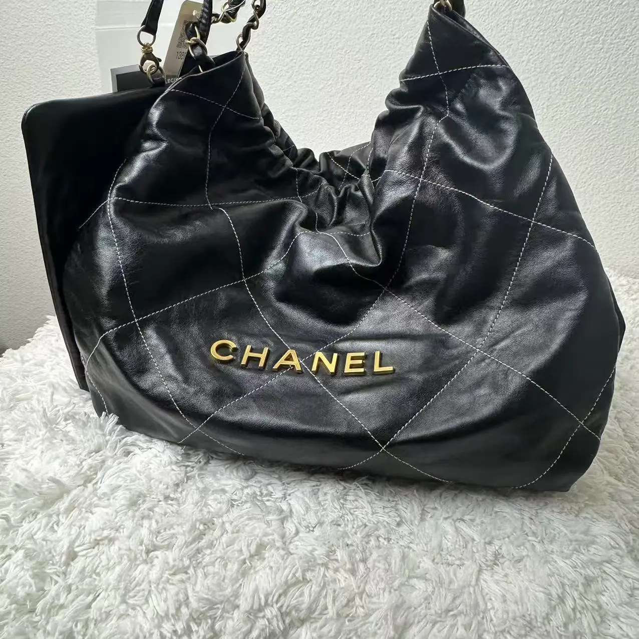 Pre-owned CHANEL LambSkin Travel Bags 22 handbag featuring gold tone hardware
