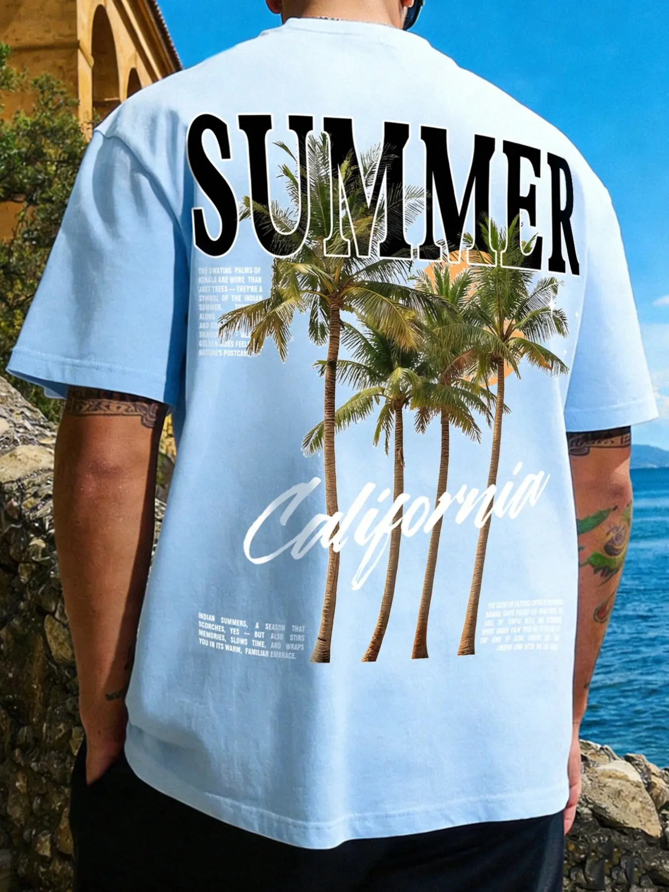 Men's California Summer Palm Tree Graphic T-Shirt | Sky Blue Tropical Vacation Tee with Artistic Back Print | Retro Coastal Aesthetic Top for Beach & Island Getaway | 2026 Trendy Relaxed Fit Summer Essential