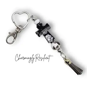 Charmingly Resilient Heart Bag Charm with Beaded Cross and Tassel Charm for Everyday Use