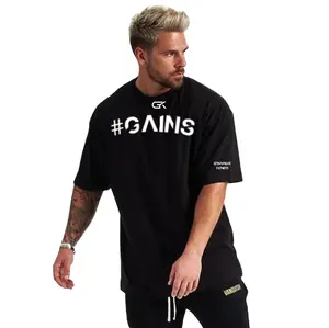 Gymaniak #GAINS 100% Cotton Oversized Gym Shirt for Ultimate Comfort and Style - Loose Fit, Breathable, Moisture-Wicking, Durable Design Athletic Workout Clothing Activewear Clothing