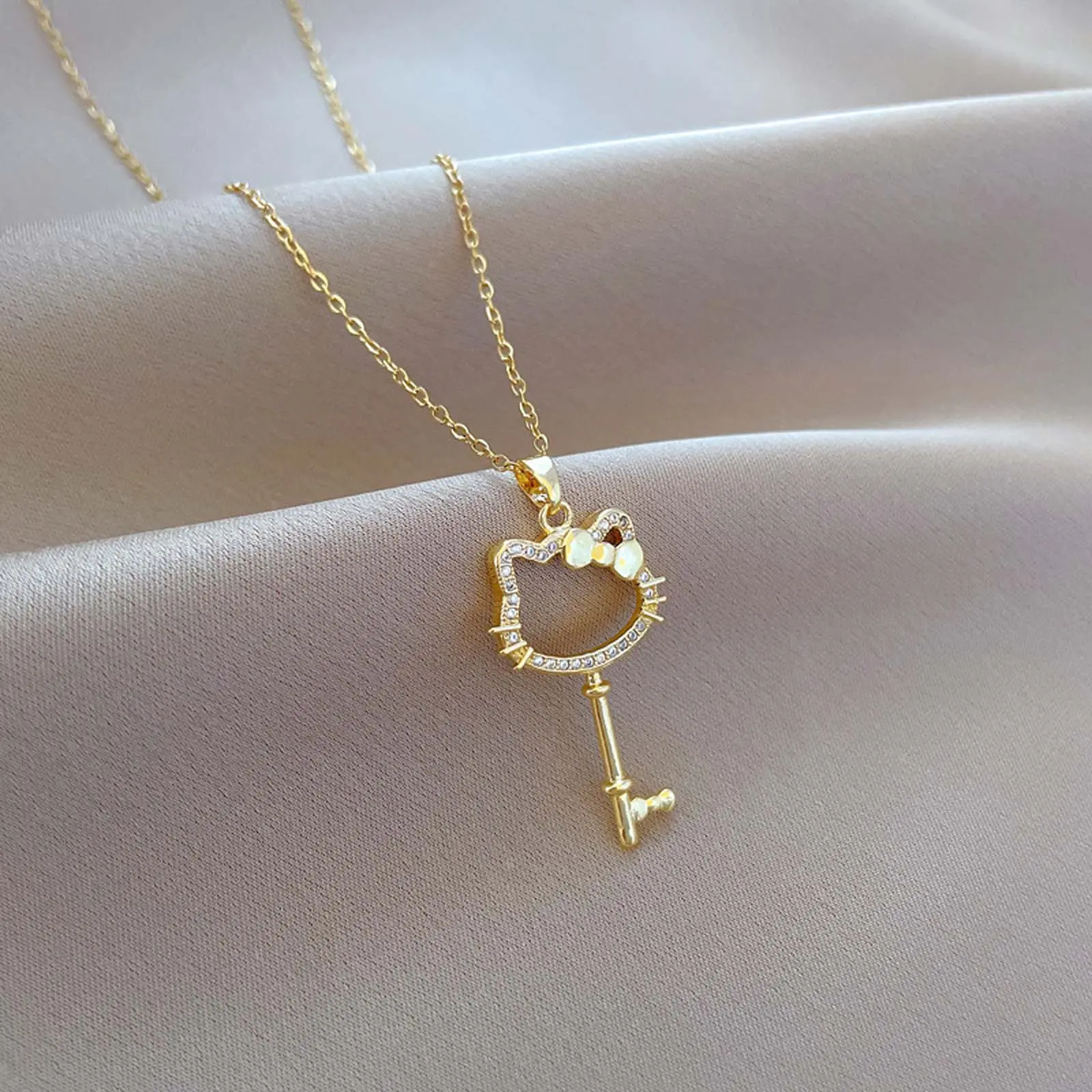 Whimsical Cat Pendant Necklace with Zircon Bow & Key, Gold-Tone Hollow Design, Dainty Adjustable Clavicle Chain, Cute Jewelry Gift for Women, Whimsical Necklace, Birthday, Casual, Female, Adjustable Chain, Hollow Alloy, Daily