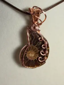 Ammonite fossil copper wire-wrapped pendant
