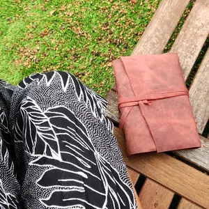 Red wrapped leather journal