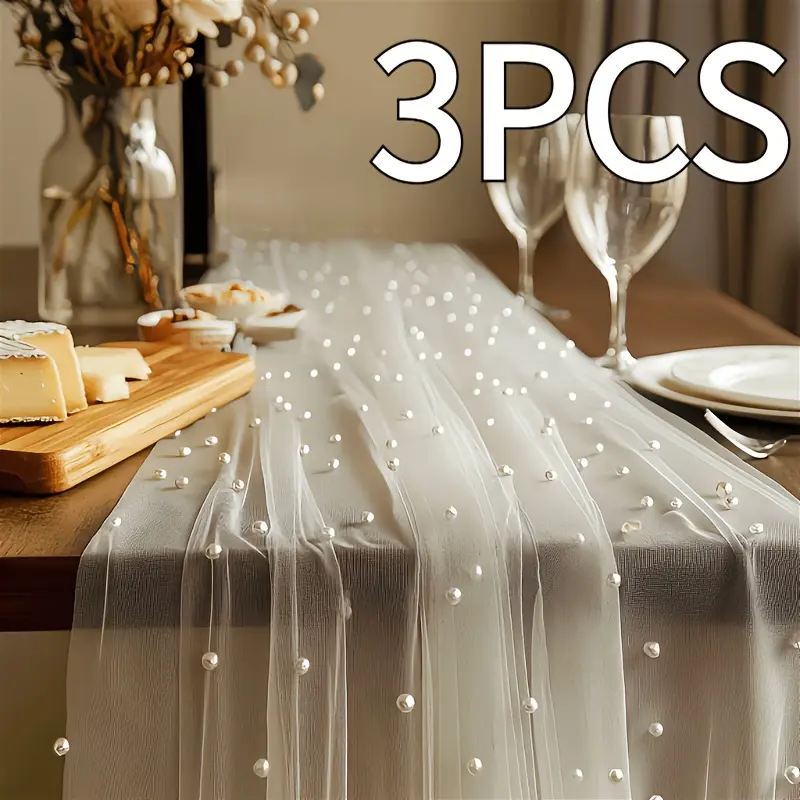 Three pieces of white pearl beaded tulle, suitable for table runners, ceremony backdrops, home decor, room decoration, birthday party decorations, and Valentine's Day ceremonies to create a romantic setting.Dimensions: 76*300cm/2.5*9.8ft