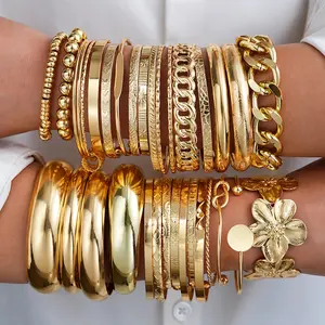“Set of stackable bracelets with various elegant vintage pieces, minimalist fashion, delicate, floral, geometric, smooth, bangle, holiday jewelry.