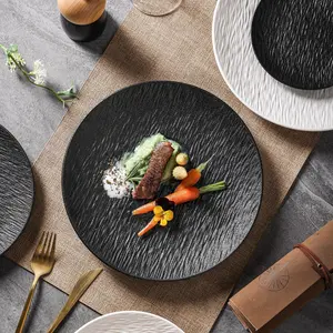 A set of 4 10 inch ceramic plates, available in black and white, with a modern minimalist style and high-end stone patterns, suitable for delicious dishes such as pasta, steak, chicken wings, etc Serving Stylish