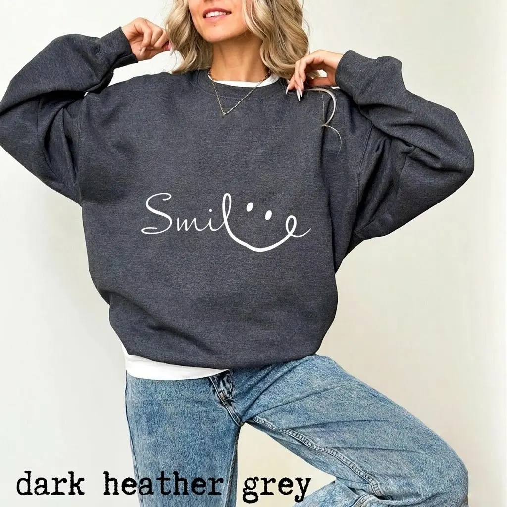 Gildan Women's Essential Smile Graphic Long Sleeve Round Neck Sweatshirt - Oversized Casual Fit Crewneck Pullover, Soft Cotton-Blend Fabric with Ribbed Spandex Details, Women's Tops, Yarn, Loose