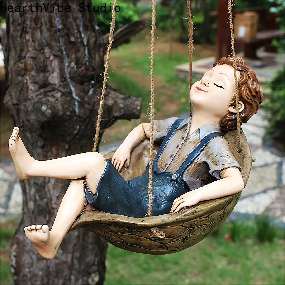 Handcrafted Resin Wall Sculpture of a Boy on a Swing, Decorative Garden Statue with Walnut Finish for Outdoor Home Decor, No