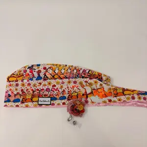 Scrub cap and badge reel