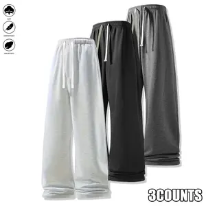 Men's loose-fit sweatpants with an elastic waistband and drawstring design, wide-leg style, and jogging side pockets, suitable for everyday wear and athletic bottoms