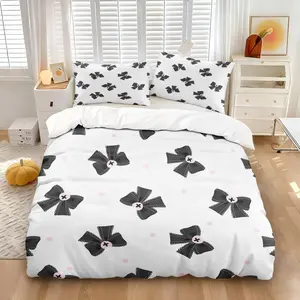 Fresh white bedding with black bow print, including a duvet cover and pillowcase set. Sweet and edgy, suitable for bedrooms, dormitories, hotels, and other settings. Soft Bedding Sets