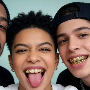 2/4/8count of single Golden oth GRILLS for HIPHOP, suitable for both men and women.These exaggerated side teeth accessories areReliable for Halloween, Thanksgiving and Christmas parties.