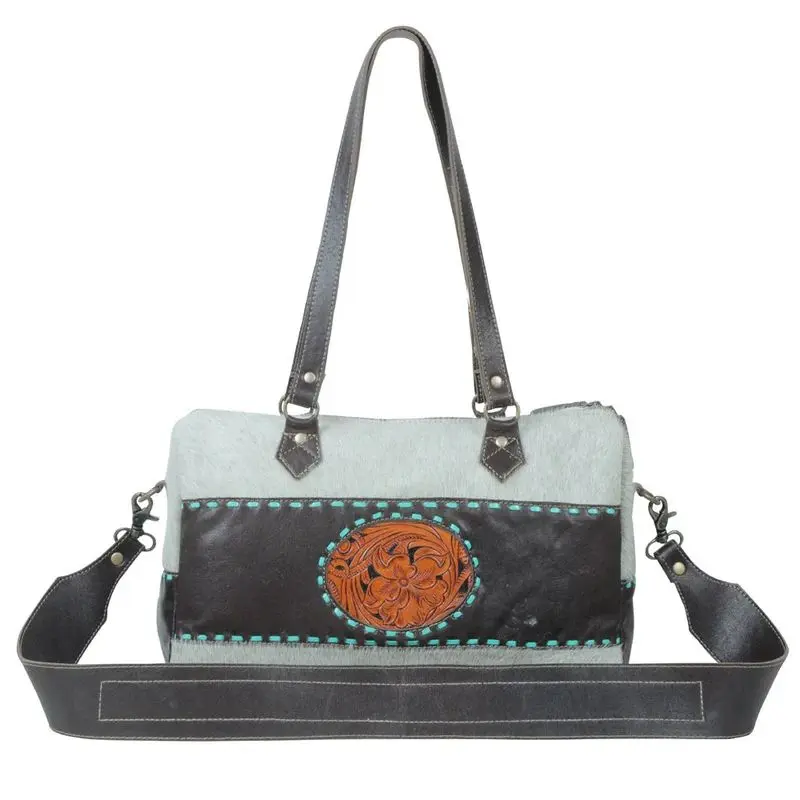 Turquoise edges hand tooled bag