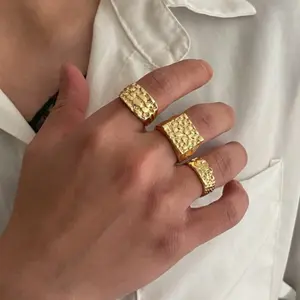 A set of three wide, square-shaped rings, 14k gold plated, in a classic Rock and Hip Hop style with a Punk design, suitable for street style, travel, parties, weddings, and everyday wear