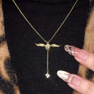 Golden Snitch Winged Ball Necklace with Movable Wings – Alloy Pendant Jewelry | Valentine’s Day Gift for Women,Gold color
