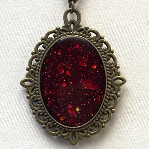 Mystic Garnet Heirloom Oval Pendant - Antique Gold Tone