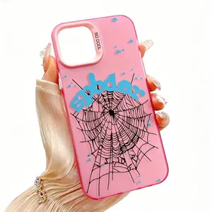 Pink spider web pattern phone case with silver accents, compatible with iPhone 17, 16, 15, 14, 13, and 12. Features a framed shockproof design.