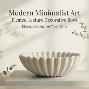 Modern minimalist pleated decorative bowl with textured surface. Dual-use for storage and display, an elegant ornament perfect for coffee tables, living rooms and entryways.