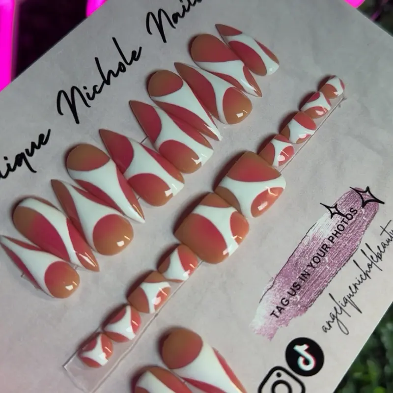 Classy airbrushed nails with abstract designs