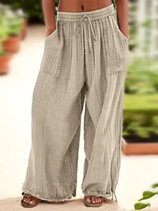 Chill Vibes Only: The Perfect Women's Pants! Elegant Women's Relaxed Fit Wide-Leg Pants with Texture, Pockets, and Drawstring Design