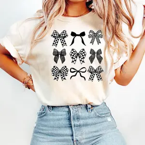 Viral Coquette Bow T-Shirt – Checkered Black Bow Graphic Tee, Retro Aesthetic Bows Shirt, Y2K Girlcore Trendy Top