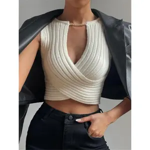 Women’s cropped knit top with a flat cut and chain decoration, featuring a casual deep V-neck and sleeveless design, suitable for everyday wear in all seasons. GARMENTARY