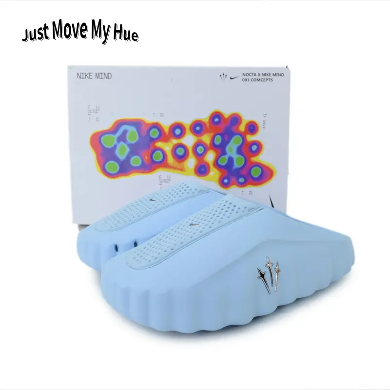 Soft pastel sky blue vented monochrome dotted traction cushioned slip-on mule slides pair smooth perforated waterproof molded EVA rubber with thick blue dot anti-slip outsole, bouncy full cloud foam sole