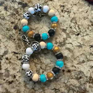 Teal and gold cow bracelet