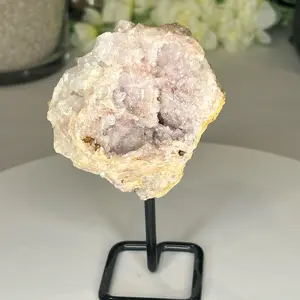 Pink Amethyst Geode on stand.