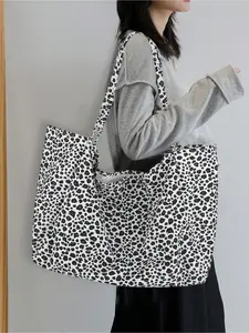 Large fashionable leopard print tote bag, spacious shoulder bag, a must-have for commuting. It can be used as an underarm bag or school bag. Featuring large capacity and easy portability, it suits teenagers, women, college students and office workers