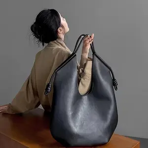 Frenchstyleminimalistleathertotebag-casualblackhoboshoulderbag,fixedstrap,edgepainteddetail,unlined-largecapacityshoulderbags