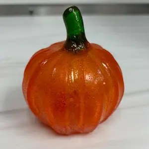Hollow Hard Candy Pumpkin stuffed with orange, lemon, and cherry gummies