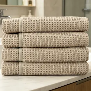 Waffle towel, 1 piece, light brown, made of absorbent microfiber, suitable for both bathroom and pool use.