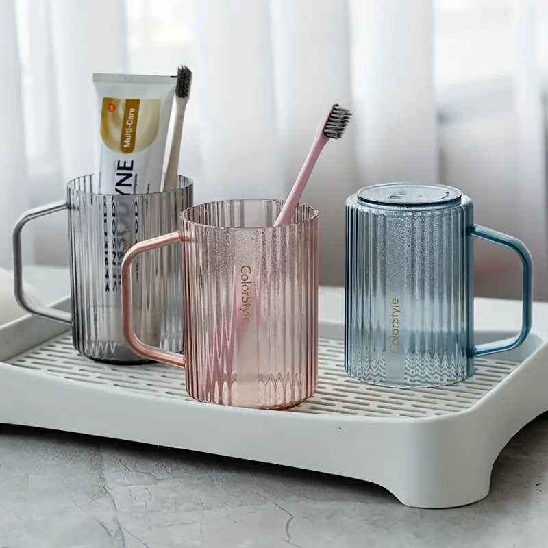 1pc Solid Color Mouthwash Cup, Simple Household Toothbrush Cup, Plastic Gargle Cup with Handle, Minimalist Bathroom Tumbler, Bathroom Accessories