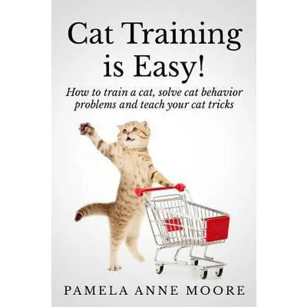 USED Book - Cat Training Is Easy!: How to train a cat, solve cat behavior problems and teach your cat tricks. by Moore, Pamela Anne (Paperback) - english