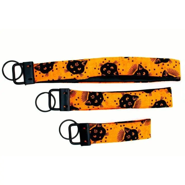 Handmade Key Fob Wristlet with Spooky Black Cat Pattern, Halloween Fabric Accessory for Handbags, Hands-Free Key Holder, Handmade Craft, Animal Print, Orange Background, 5 Or 7 Inches, 5/7" Sizes, Casual, Daily, Everyday, Extra Spookiness