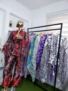 Nifemi Red Batik Two-Piece Set - Lightweight Kaftan Top & Wide-Leg Pants - Bold Batik Print - Versatile for Casual & Semi-Formal Occasions