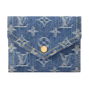 LOUIS VUITTON Victorine Quilted Snap Closure Organic Cotton Wallet for Women in Denim Blue