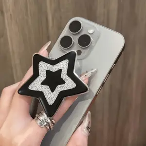 1 piece Ins-style star-shaped multifunctional phone pop-socket holder - Made of ABS material, with a retractable back, multifunctional desktop stand, shiny and beautiful, perfect for optimizing desktop space and providing comfortable viewing (black)