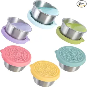 Reusable stainless steel condiment cups with lids, 1.6oz each. Leakproof design ideal for sauces, dips, and dressings in lunch boxes or on the go.