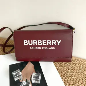 Pre-owned BURBERRY letter print shoulder/crossbody WOC bag