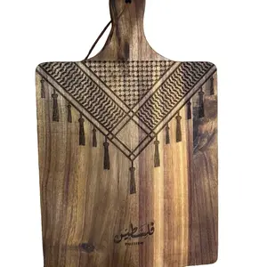 Palestine Kufiyah wooden cutting board. Estimated size: 16” X 8”. Kitchen