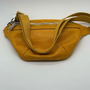Pre-owned leather bum bag GUCCI Calfskin GG Tennis