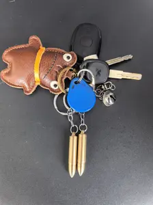 Compact keychain, with ear pick included, desk decoration, backpack accessory, keychain ornament