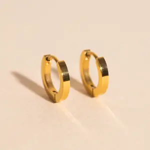 O.G. Smooth Huggie Hoop Earrings O.G. Smooth Huggie Hoop Earrings