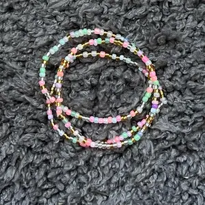 Colorful Beaded Stacking Bracelet with Pastel Shades and Gold Accents for Stylish Accessory