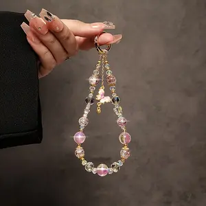 Luxurious and high-end butterfly beaded chain handbag wrist short strap with clip phone case keychain bag pendant pink butterfly pendant gold foil bead bracelet Bling Bling Keychains [includes transparent clip]