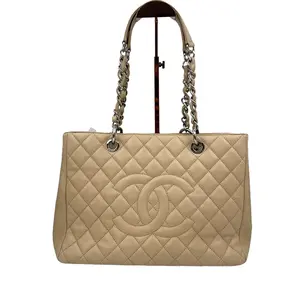 Pre-owned CHANEL France Clutches & Wristlets GST Milk tea color Quilted Texture Crossbody Bag with Iconic Logo for Everyday Carry & Special Events Elegant Design Clutches & Wristlets