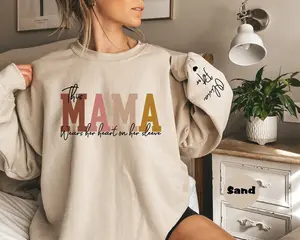 Custom This Mama Wears Her Heart On Her Sleeve Sweatshirt, Personalized Mom Sweatshirt With Kids Names, Cute Momma Outfit, Mothers Day Gifts